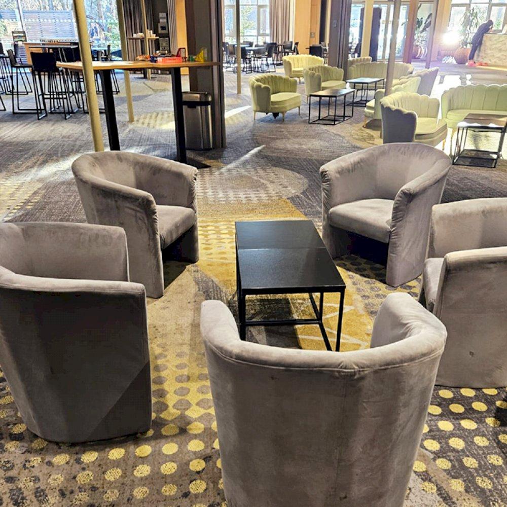 Hire our tub chairs and box frame tables to create a chic and sophisticated reception area.